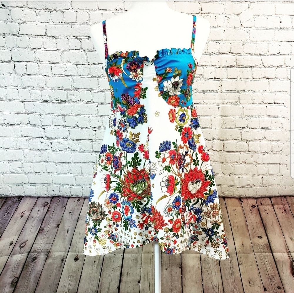 Handmade beaded floral top.